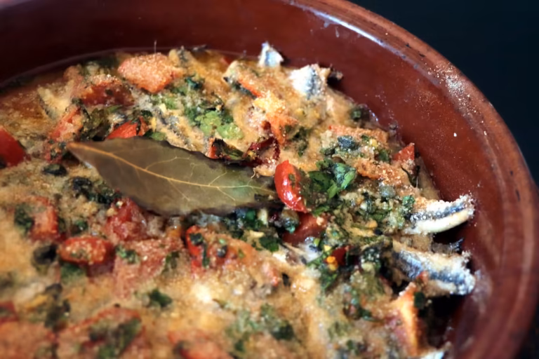 Anchois au four dans un plat en terre cuite, recette de Jean Brunelin