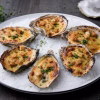 Huitres gratinees a la creme de comte, croutons dores et ciboulette ciselee