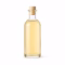 Flacon en verre de vinaigre balsamique blanc sur fond blanc