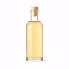 Flacon en verre de vinaigre balsamique blanc sur fond blanc