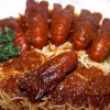 Macaronade aux cigales de Sète, spaghettis nappés de sauce tomate à l'écorce d'orange